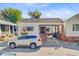Charming single-story home with a brick and white facade and a convenient covered parking area at 6 Dewey St, Charleston, SC 29403