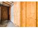 Unfinished room with wood-paneled walls and white door, awaiting renovation at 6 Dewey St, Charleston, SC 29403