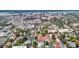 An aerial view of a charming city with tree-lined streets and the cityscape in the background at 68 Vanderhorst St # A, Charleston, SC 29403