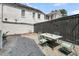 Inviting backyard with outdoor dining area, perfect for entertaining guests at 68 Vanderhorst St # A, Charleston, SC 29403