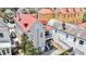Charming gray home with a vibrant red roof, a black porch, and classic Southern architecture at 68 Vanderhorst St # A, Charleston, SC 29403