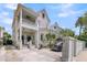 Beautiful home with a charming porch, balcony, and well-maintained landscaping at 68 Vanderhorst St # A, Charleston, SC 29403