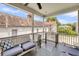 Open air porch with comfortable seating area featuring a metal staircase at 68 Vanderhorst St # B, Charleston, SC 29403