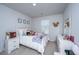 Bright bedroom with decor and a comfortable bed at 6976 Pumpkinseed Dr, Johns Island, SC 29455