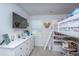 Charming ' bedroom with bunk beds, a desk, and a dresser, ideal for play and study at 6976 Pumpkinseed Dr, Johns Island, SC 29455