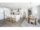 Open-concept kitchen and dining area, perfect for entertaining with modern appliances at 6976 Pumpkinseed Dr, Johns Island, SC 29455