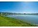 Scenic view of a pond with homes in the background in the community at 6976 Pumpkinseed Dr, Johns Island, SC 29455