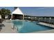 Community pool with lounge seating and covered pavilion area at 6976 Pumpkinseed Dr, Johns Island, SC 29455