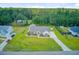 Aerial shot of a well-kept home with large backyard, detached storage building, and private driveway at 708 Tierra Loop, Summerville, SC 29483