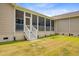 View of a back porch, stairs, and backyard at 708 Tierra Loop, Summerville, SC 29483