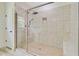 Bathroom shower with glass door, tile surround and built in bench at 708 Tierra Loop, Summerville, SC 29483