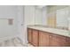 Bathroom featuring granite countertop vanity with storage cabinets and a shower/tub combo at 708 Tierra Loop, Summerville, SC 29483