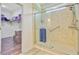 Modern glass walk-in shower with tiled walls and a stainless steel shower head at 708 Tierra Loop, Summerville, SC 29483