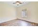 Bedroom featuring wood floors, a ceiling fan and a window at 708 Tierra Loop, Summerville, SC 29483