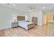 Spacious bedroom boasts hardwood floors, a ceiling fan, and classic wooden furniture at 708 Tierra Loop, Summerville, SC 29483