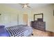Large bedroom boasting hardwood floors, a ceiling fan, a walk in closet, and a dresser at 708 Tierra Loop, Summerville, SC 29483