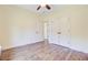 Spacious, empty bedroom with wood floors, a ceiling fan, and a double closet at 708 Tierra Loop, Summerville, SC 29483