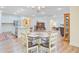 Open concept dining room view with modern furnishings, wood floors, and lots of light at 708 Tierra Loop, Summerville, SC 29483
