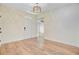 Entryway with wood floors and white door at 708 Tierra Loop, Summerville, SC 29483