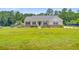 Charming single-story home featuring manicured landscaping, stone accents, and a welcoming front porch at 708 Tierra Loop, Summerville, SC 29483