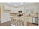 Modern kitchen with stainless steel appliances, granite countertops, and stone kitchen island at 708 Tierra Loop, Summerville, SC 29483