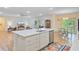 Kitchen island with stainless steel appliances, lots of counter space, and adjacent dining area, perfect for entertaining at 708 Tierra Loop, Summerville, SC 29483