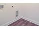 Laundry room hookups with vinyl floors and base molding at 708 Tierra Loop, Summerville, SC 29483