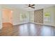 Living room with lots of light, stone accent wall and wood flooring at 708 Tierra Loop, Summerville, SC 29483