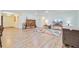 Expansive living area with hardwood flooring and natural light from multiple windows, perfect for gatherings and relaxation at 708 Tierra Loop, Summerville, SC 29483