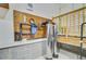 Basement with water filtration system on concrete block wall, next to stairs at 708 Tierra Loop, Summerville, SC 29483