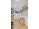 Neat and organized walk-in closet with wood floors and shelving for storage at 708 Tierra Loop, Summerville, SC 29483