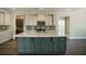 Beautiful kitchen with a large island, stainless steel appliances, and granite countertops at 713 Breakers Reef Ln, Huger, SC 29450