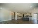 Spacious living room with hardwood floors and an open floor plan to the kitchen at 713 Breakers Reef Ln, Huger, SC 29450