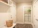 Mud room with built in storage and access to laundry room and garage at 713 Breakers Reef Ln, Huger, SC 29450