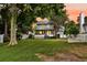 Charming two-story home with a spacious backyard and a screened-in porch, perfect for outdoor relaxation at 721 Lake Frances Dr, Charleston, SC 29412
