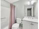 Bright bathroom features a shower and tub combination and a vanity with sink at 721 Lake Frances Dr, Charleston, SC 29412