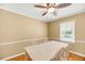 Bright dining room with hardwood floors, wooden table, and ceiling fan at 721 Lake Frances Dr, Charleston, SC 29412