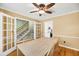 Bright dining room with hardwood floors and access to a staircase at 721 Lake Frances Dr, Charleston, SC 29412