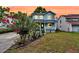 Beautiful two-story home with a well-maintained lawn and flower garden at 721 Lake Frances Dr, Charleston, SC 29412
