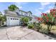 Inviting two-story home with a private drive, garage, well-kept lawn, and a charming front porch at 721 Lake Frances Dr, Charleston, SC 29412