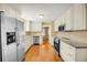 Modern kitchen featuring stainless steel appliances, granite countertops, and ample cabinet space at 721 Lake Frances Dr, Charleston, SC 29412