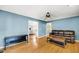 Inviting living room features wood floors, ceiling fan, and flows into the kitchen at 721 Lake Frances Dr, Charleston, SC 29412