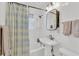 All-white bathroom with new fixtures and accessories, featuring a shower and tub at 727 Savannah Hwy, Charleston, SC 29407
