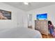 Bedroom featuring hardwood floors, a ceiling fan, and a dresser with a TV at 727 Savannah Hwy, Charleston, SC 29407