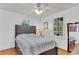 Bedroom with ceiling fan, natural light, hardwood floors, and neutral decor at 727 Savannah Hwy, Charleston, SC 29407