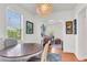 Bright dining area with a round table, window seating, and an open layout at 727 Savannah Hwy, Charleston, SC 29407