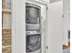 Modern washer and dryer tucked in a closet with wall decor, maximizing space at 727 Savannah Hwy, Charleston, SC 29407