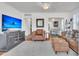 Spacious living room with hardwood floors, ample natural light, and stylish furnishings at 727 Savannah Hwy, Charleston, SC 29407