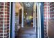 Inviting foyer with hardwood floors, arched doorways, and views into the dining and living spaces at 808 Long Drive Rd, Summerville, SC 29485