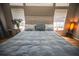 Bright main bedroom featuring ensuite, hardwood floors, and decor at 808 Long Drive Rd, Summerville, SC 29485